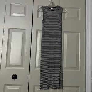Striped sleeveless Fashion Nova dress with side slit at the bottom